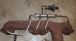 What is name of this piece on exhaust manifold?-manifold.png