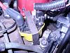 How the heck does the coil mount on the manifold???-p1030757.jpg