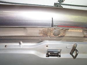 Fix rust under hatch lid or leave it alone?-hatch-rust-ta-1.jpg